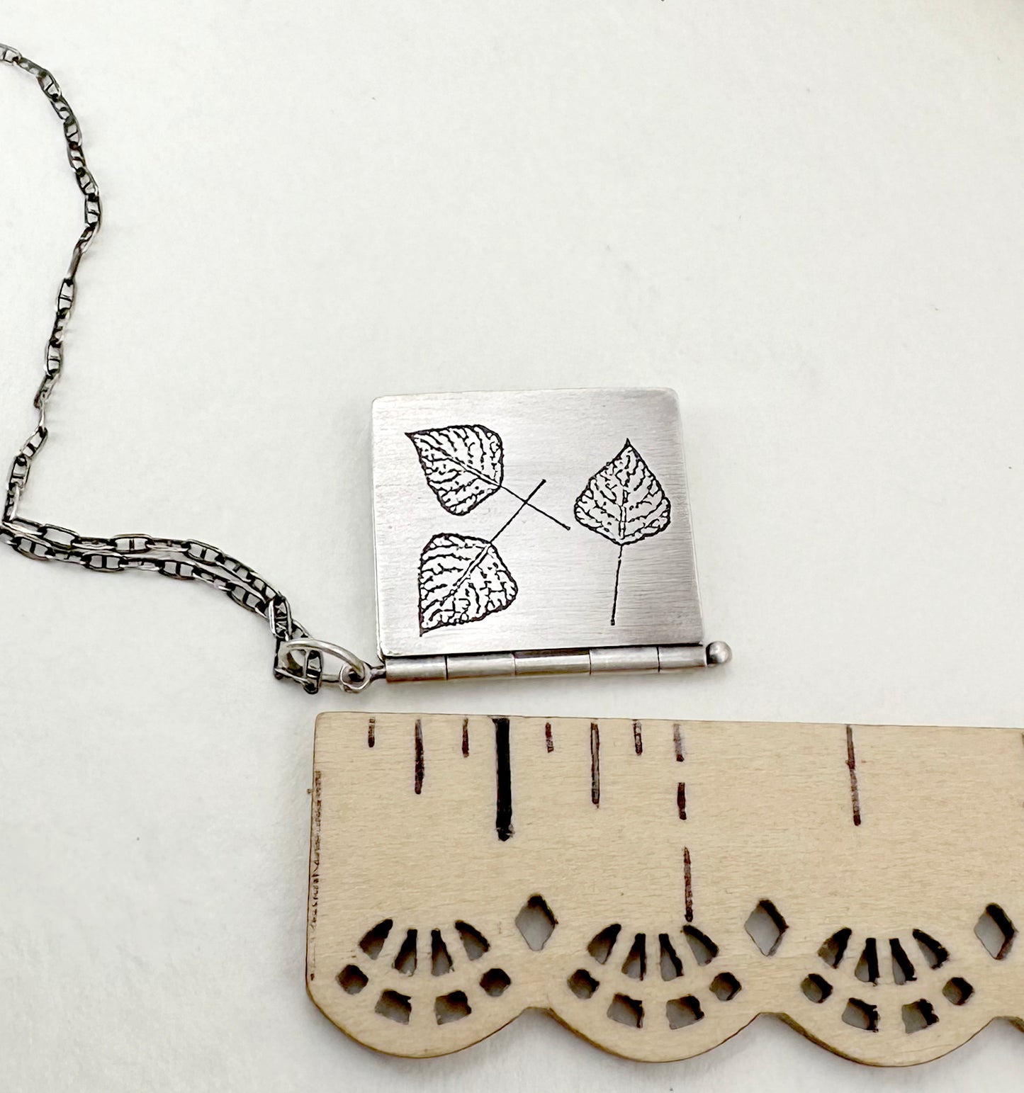 Quaking Aspen "We Shake" Sterling Silver Book Pendant