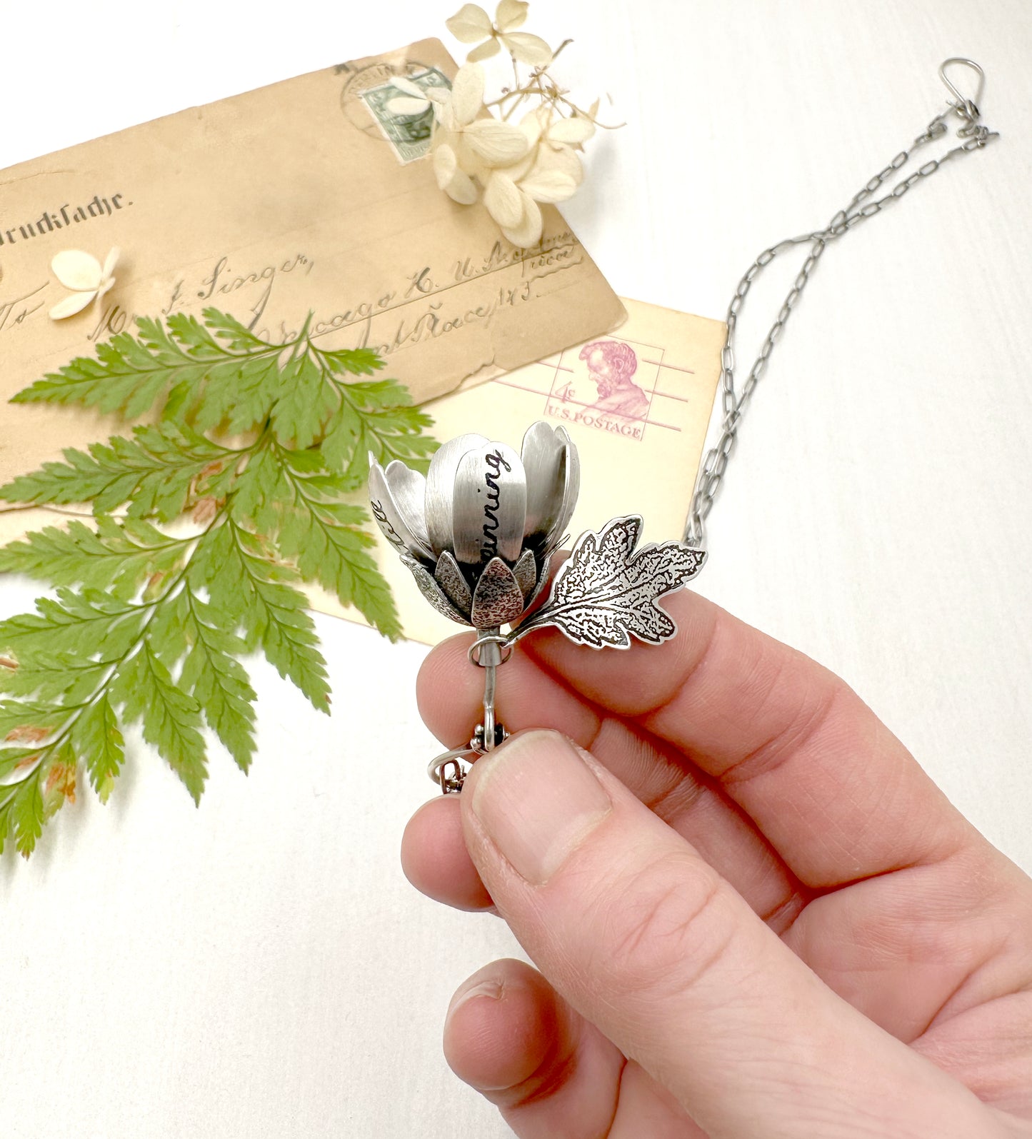 Kinetic Sterling Silver and Turquoise Flower "The world is still spinning..."