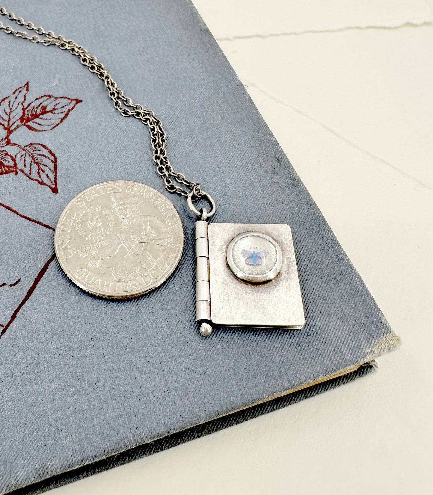 All Shall Be Well Sterling Book Locket with Tiny Blue Butterfly