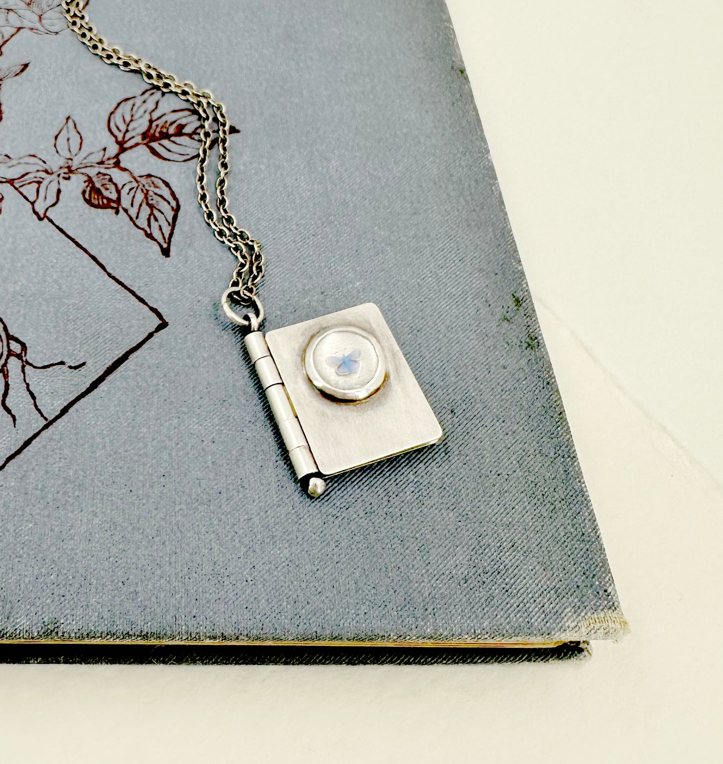 All Shall Be Well Sterling Book Locket with Tiny Blue Butterfly