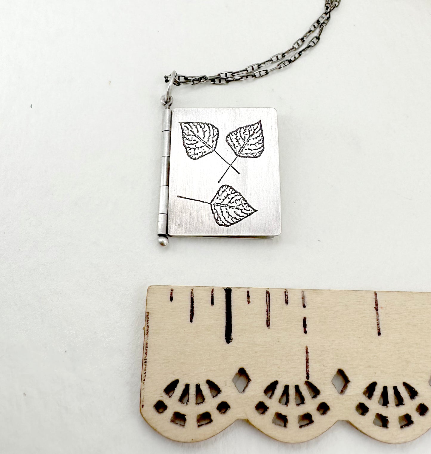 Quaking Aspen "We Shake" Sterling Silver Book Pendant