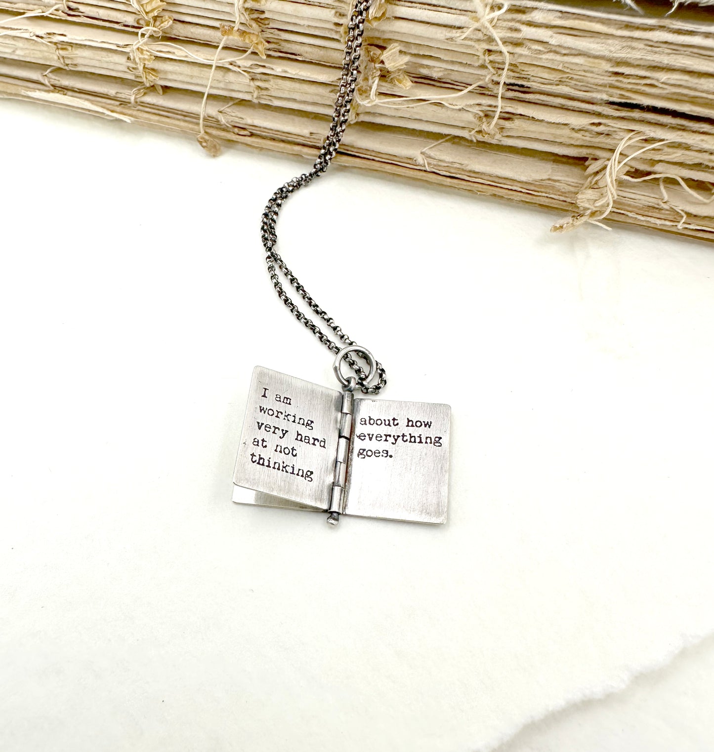 "Everything goes..." Sterling Silver Book with Joan Didion quote