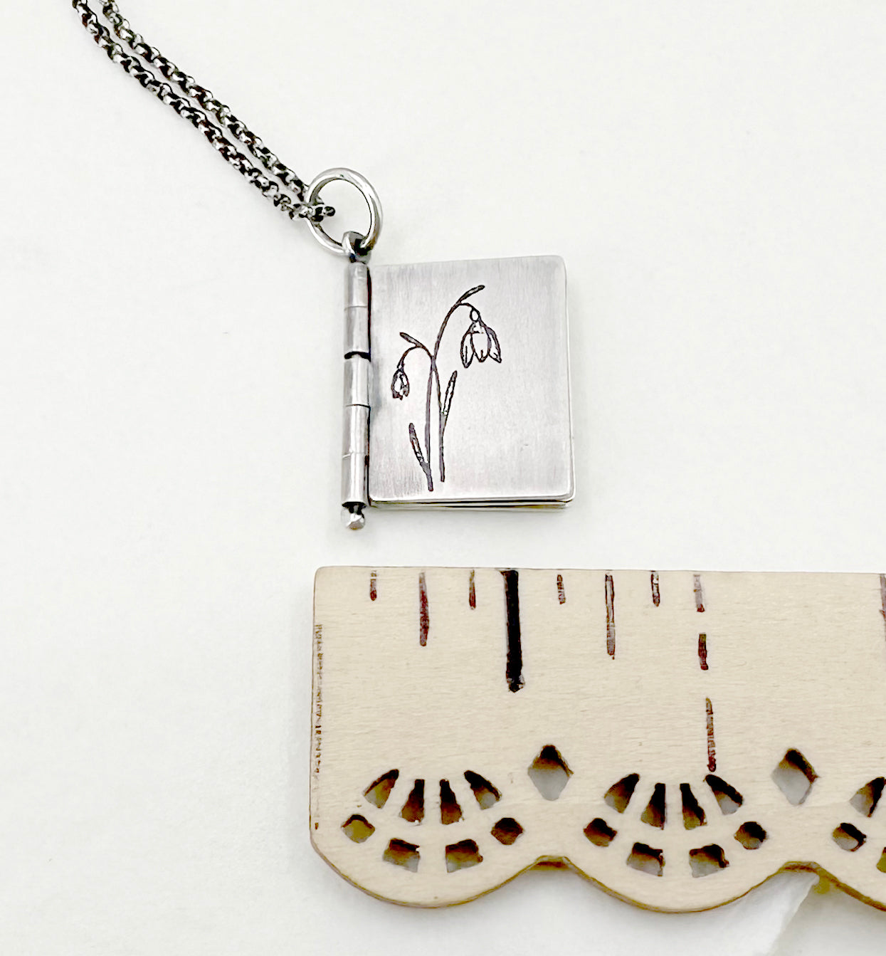 "Everything goes..." Sterling Silver Book with Joan Didion quote