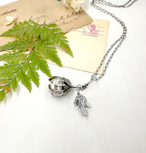 Kinetic Sterling Silver and Turquoise Flower "The world is still spinning..."
