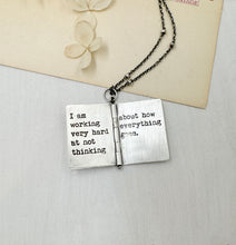Load image into Gallery viewer, &quot;Everything goes...&quot; Sterling Silver Book with Joan Didion quote (3 pages)