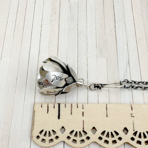 Kinetic Sterling Silver and Sapphire Flower “Raise your words, not your voice…” Rumi quote