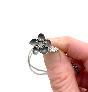 Tiny Kinetic Forget Me Not Pendant with Aquamarine