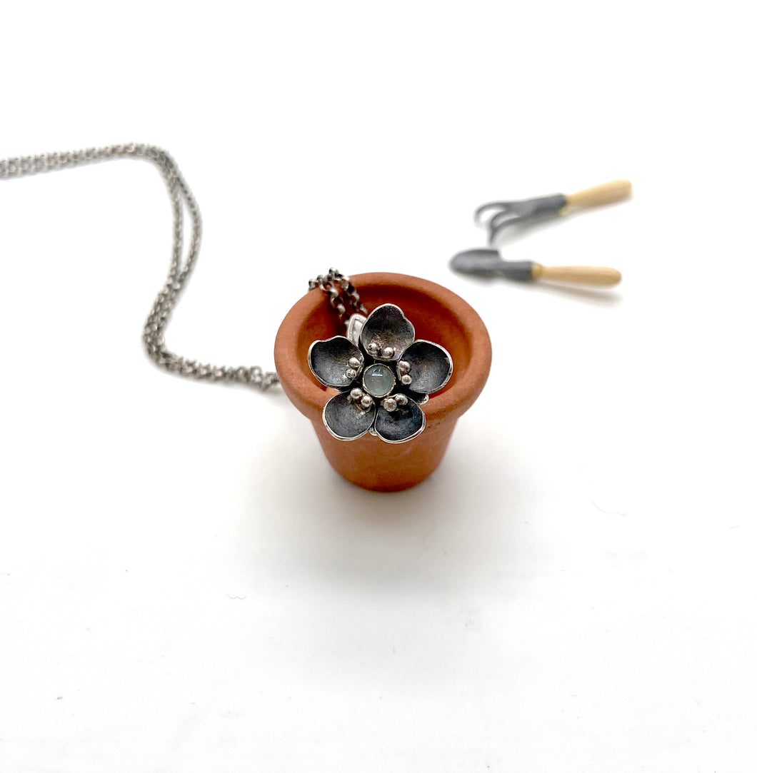Tiny Kinetic Forget Me Not Pendant with Aquamarine