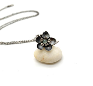 Tiny Kinetic Forget Me Not Pendant with Aquamarine