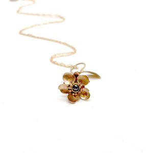 Tiny 14k and 22k Gold Kinetic Flower with blue Diamond