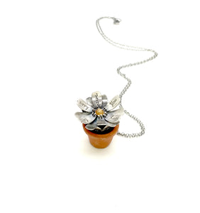 "You've got to have nerve" Sterling and Sunstone Georgia O'Keeffe Kinetic Flower Pendant