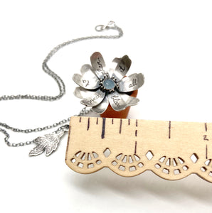 "Don't try to pull open the flowers..." Sterling and Aquamarine Kinetic Flower