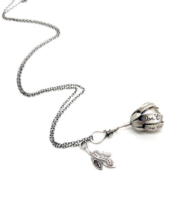 "Don't try to pull open the flowers..." Sterling and Aquamarine Kinetic Flower