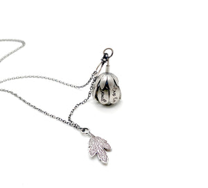 "Don't try to pull open the flowers..." Sterling and Aquamarine Kinetic Flower